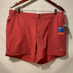 American Outdoorsman shorts in a coral color